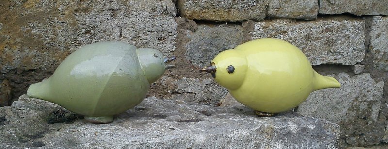 two pottery birds
